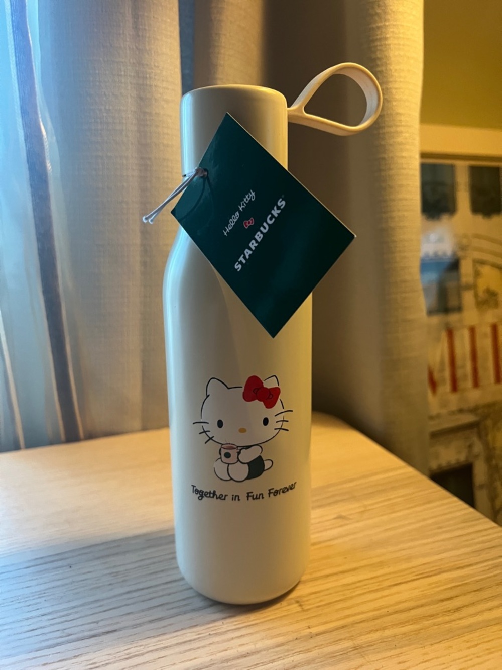 Starbucks Cream Hello Kitty Bottle with Red Bow Accent